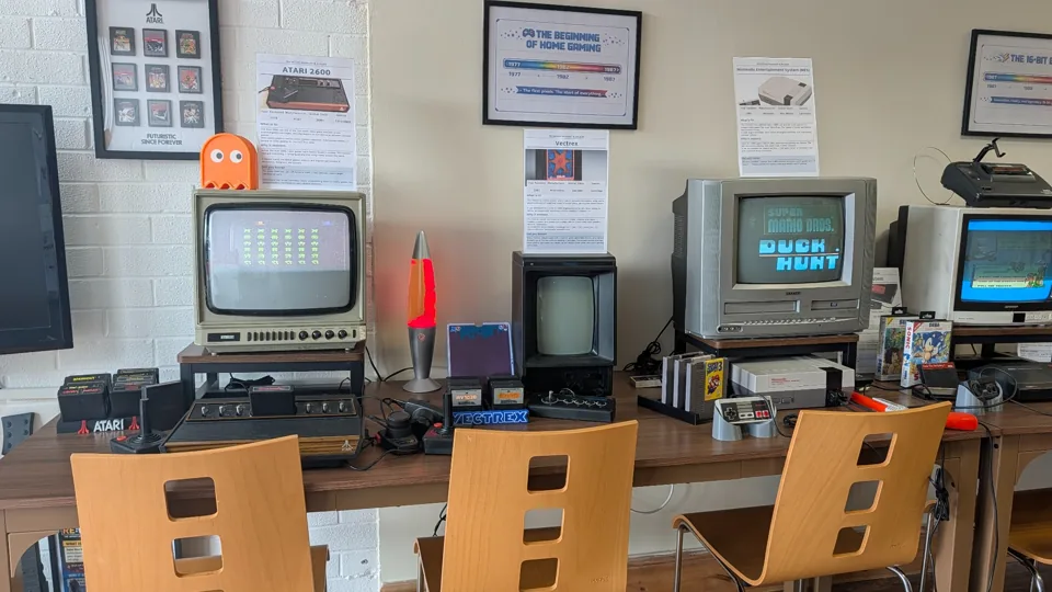 Classic consoles connected to CRT televisions at Re:Wired
