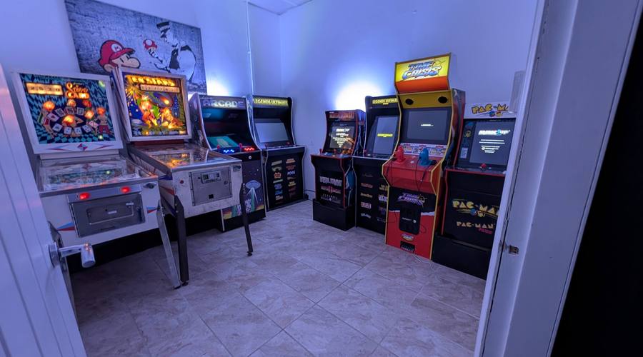 The Re:Wired arcade room with cabinets and pinball machines