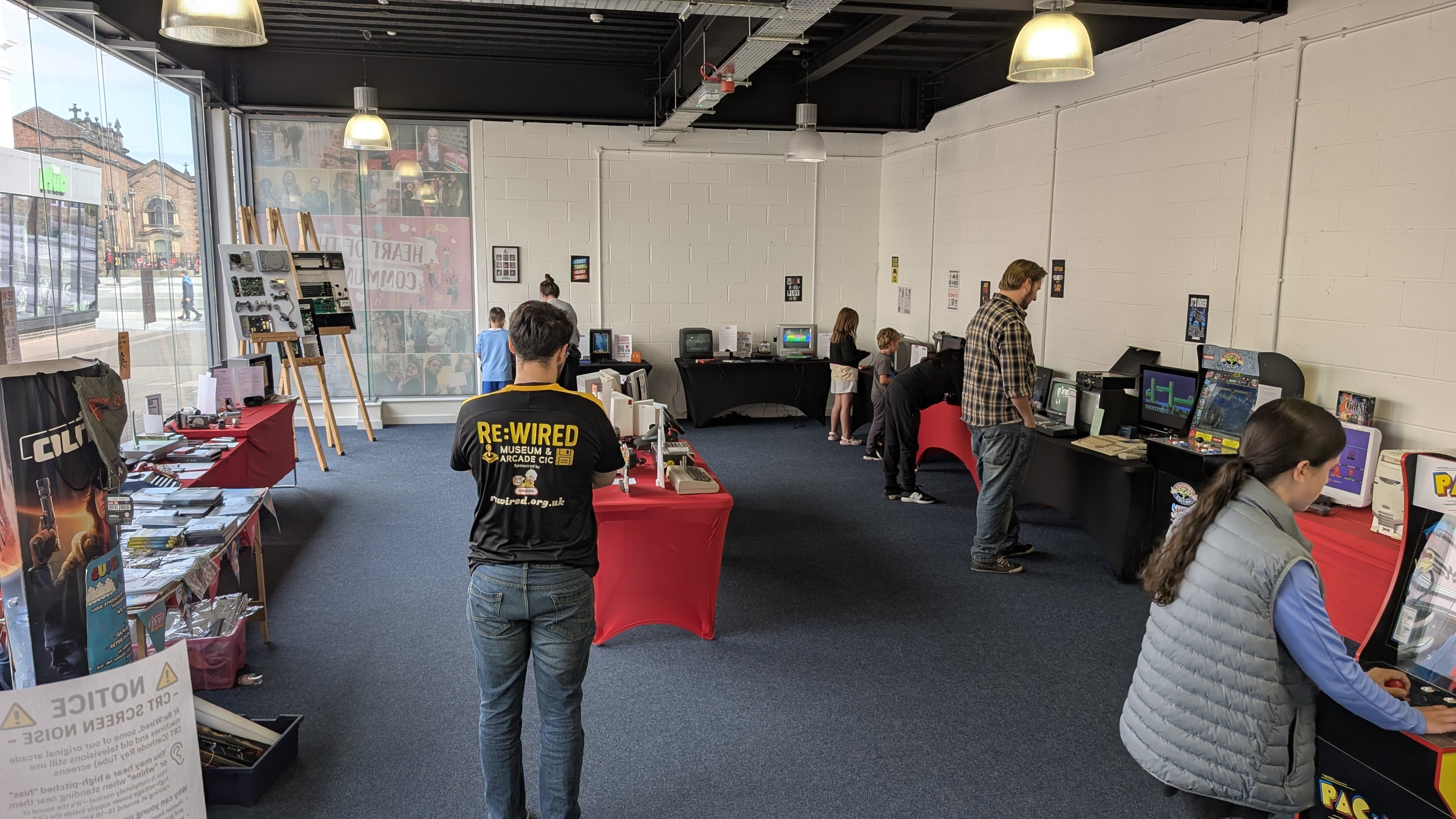 Visitors exploring the Re:Wired popup museum and arcade at Wellington Square in Stockton-On-Tees